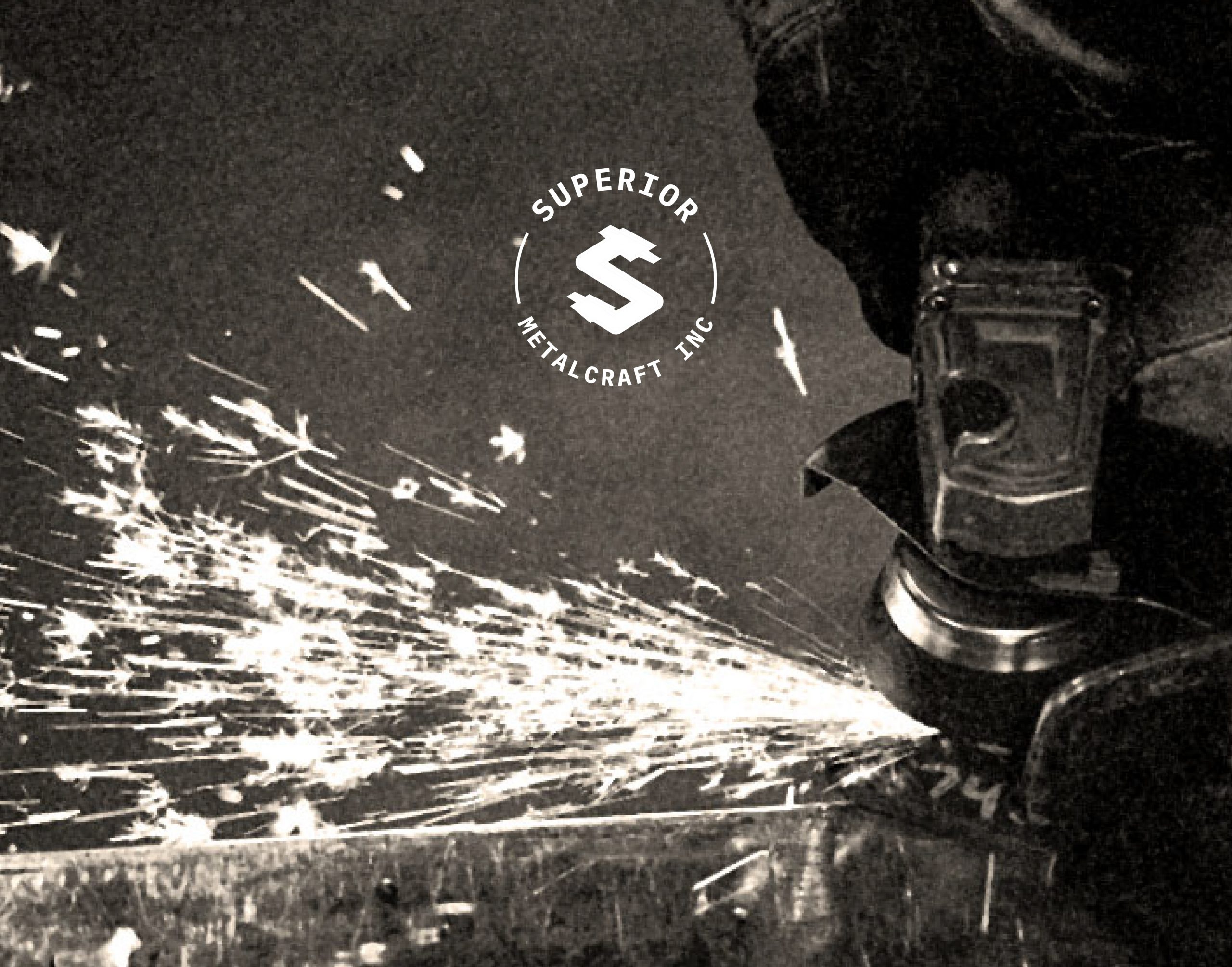 sparks appearing from the metal grinding machine with a logo of their brand